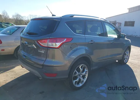 2014 Ford Escape Titanium z USA, uszkodzony, nr VIN 1FMCU0JX6EUC27993